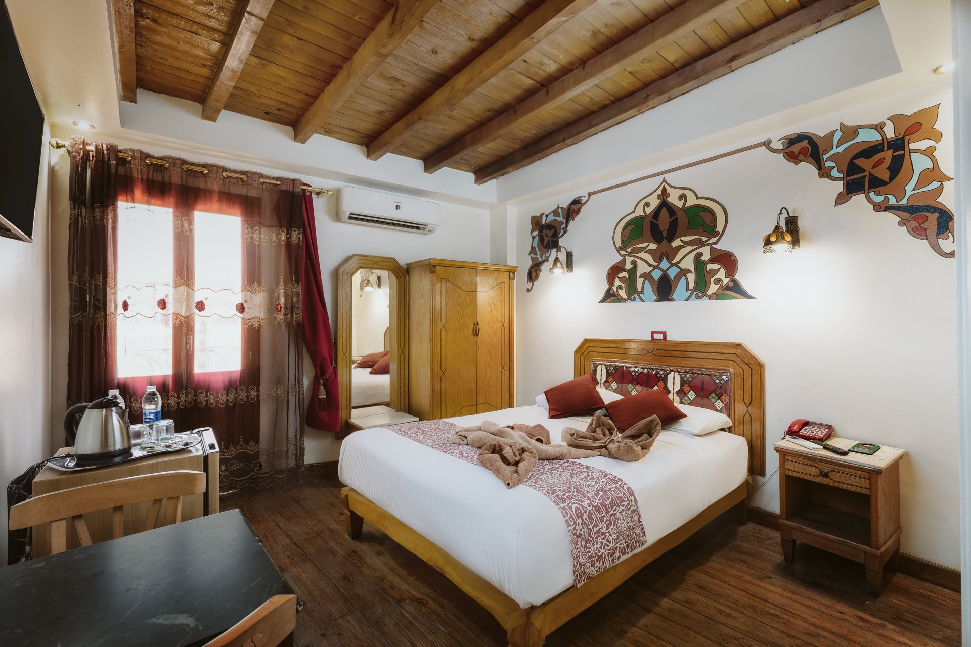 A welcoming guest room at Nefertiti Hotel